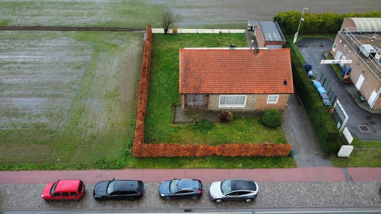 Ruime woning met grote tuin foto 29