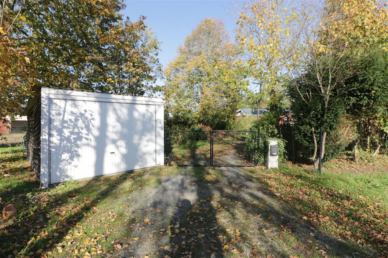 Rustig gelegen woning met 2 slpk, riante tuin en garage foto 22