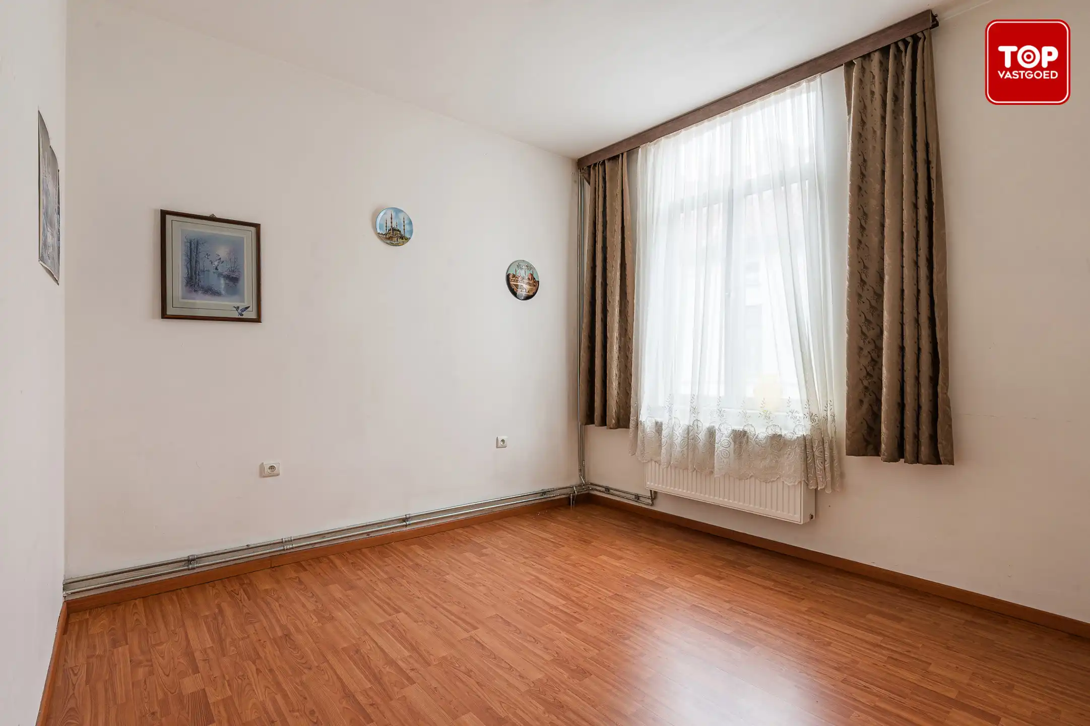 Op te frissen woning met 4 slaapkamers op gunstige locatie.  foto 14