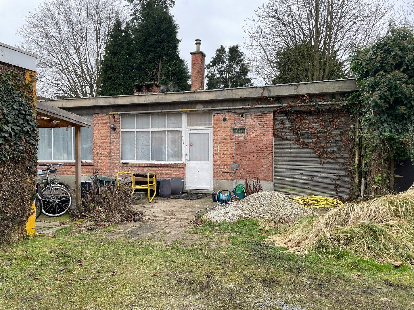 Woning met bouwgrond en achterliggend atelier foto 8