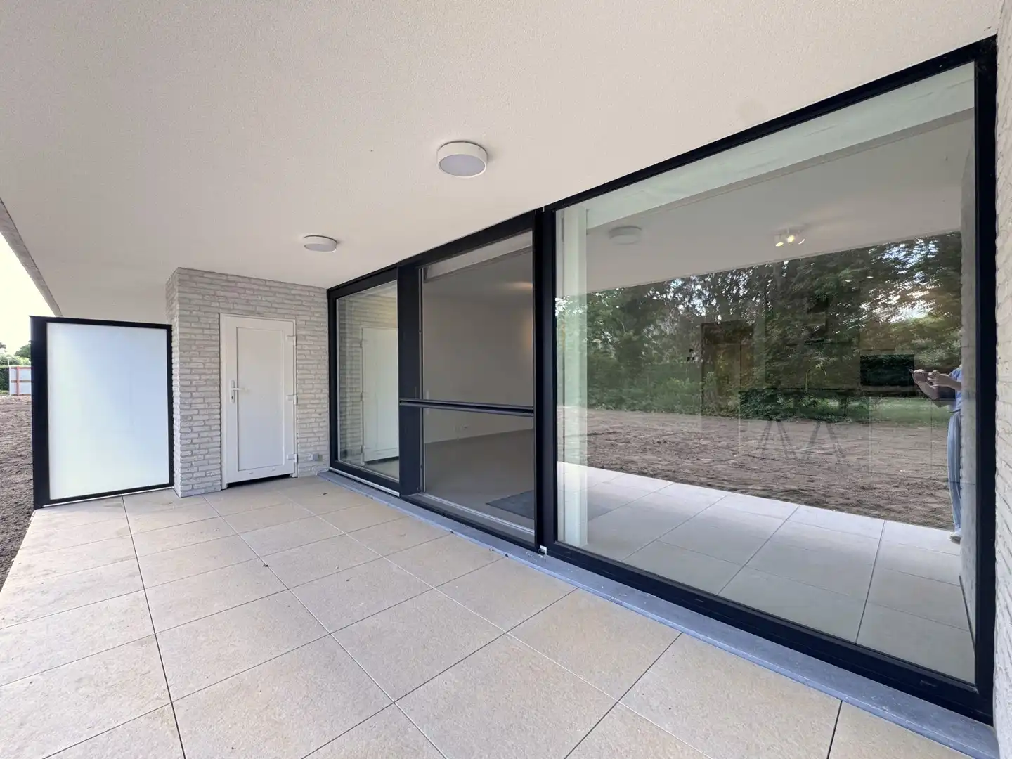 Prachtig nieuwbouwappartement met groot terras en tuin! (prijs inclusief garagebox en syndickosten) foto 11
