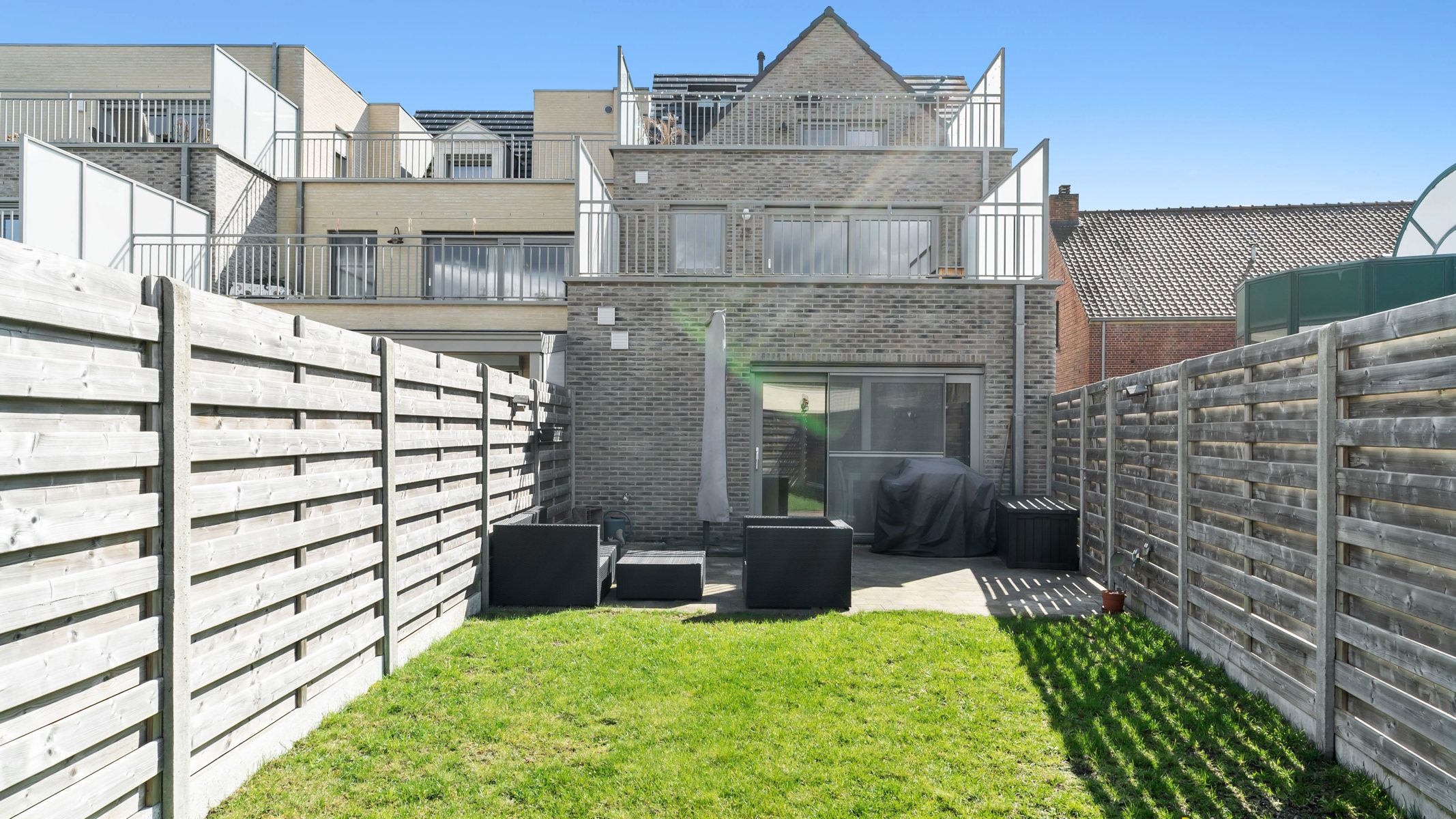 Gelijkvloers appartement met tuin en 2 autostaanplaatsen (1 ondergronds met berging en 1 bovengronds) foto 13