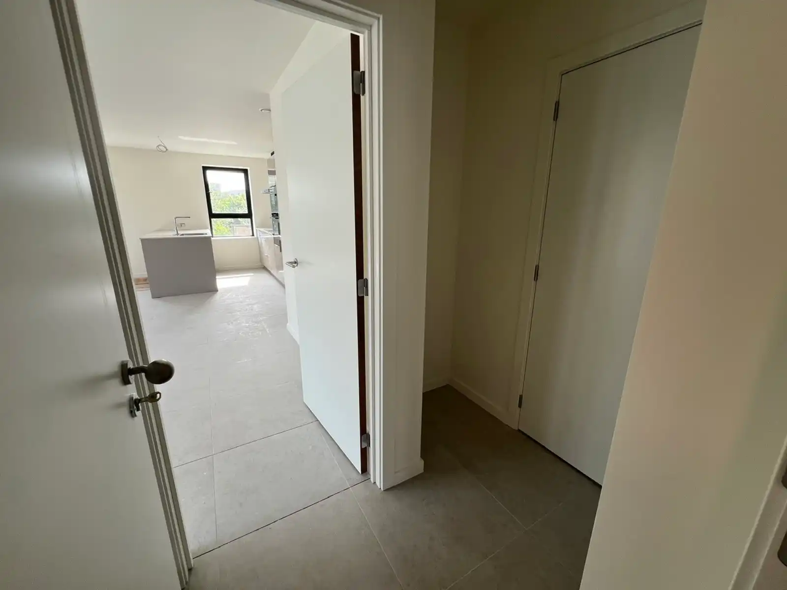 Nieuwbouwapp met 1slpk, ZW terras (26m²) en parking foto 3