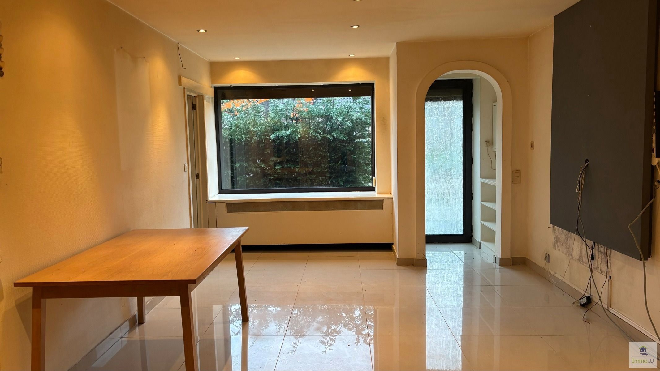 Te renoveren gelijkvloers appartement met garage  foto 2