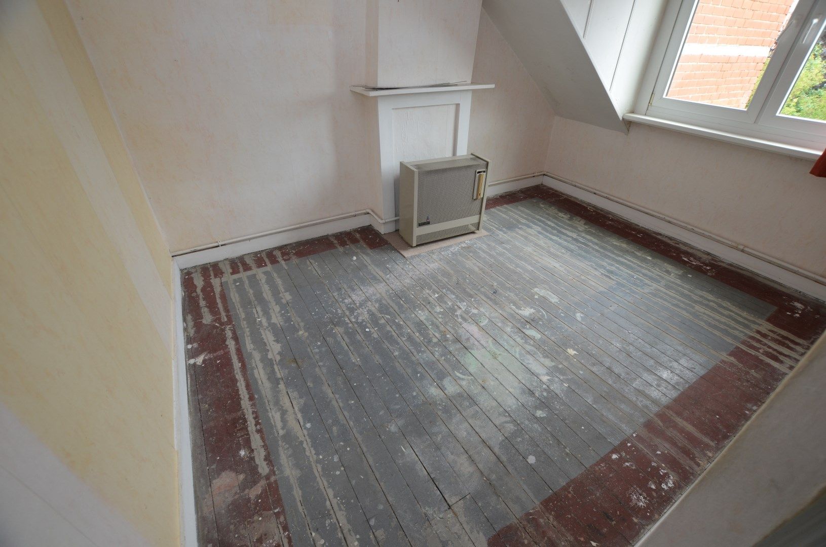 Te renoveren karaktervolle ruime woning met zonnige tuin foto 11