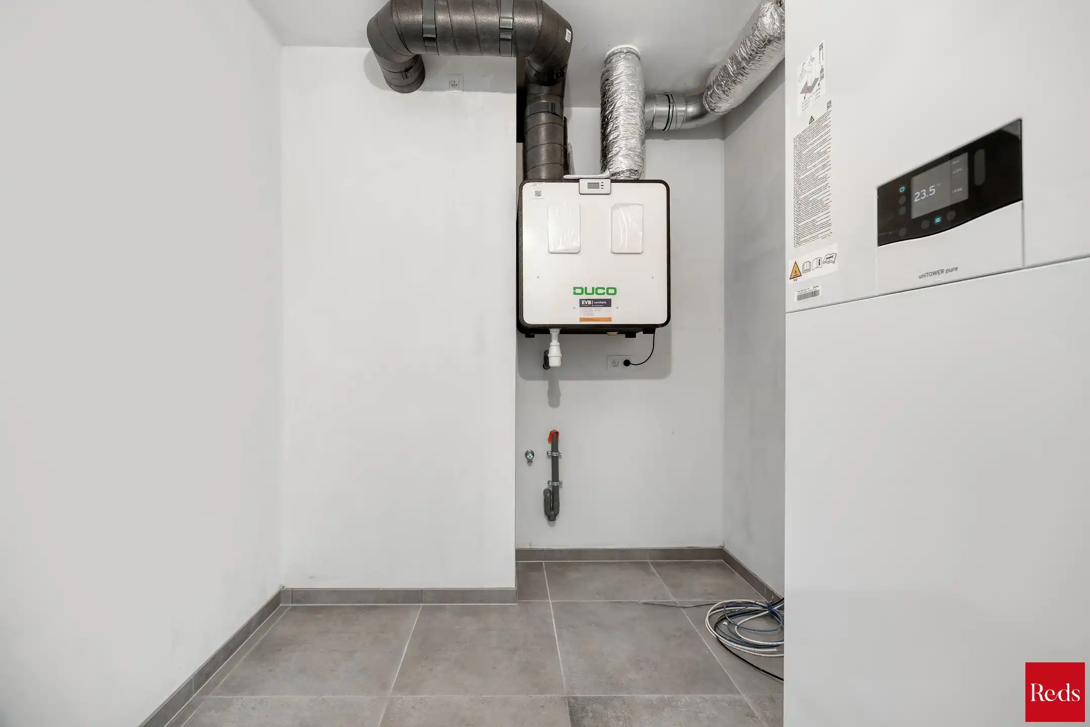 Stijlvol gelijkvloers appartement met tuin foto 17