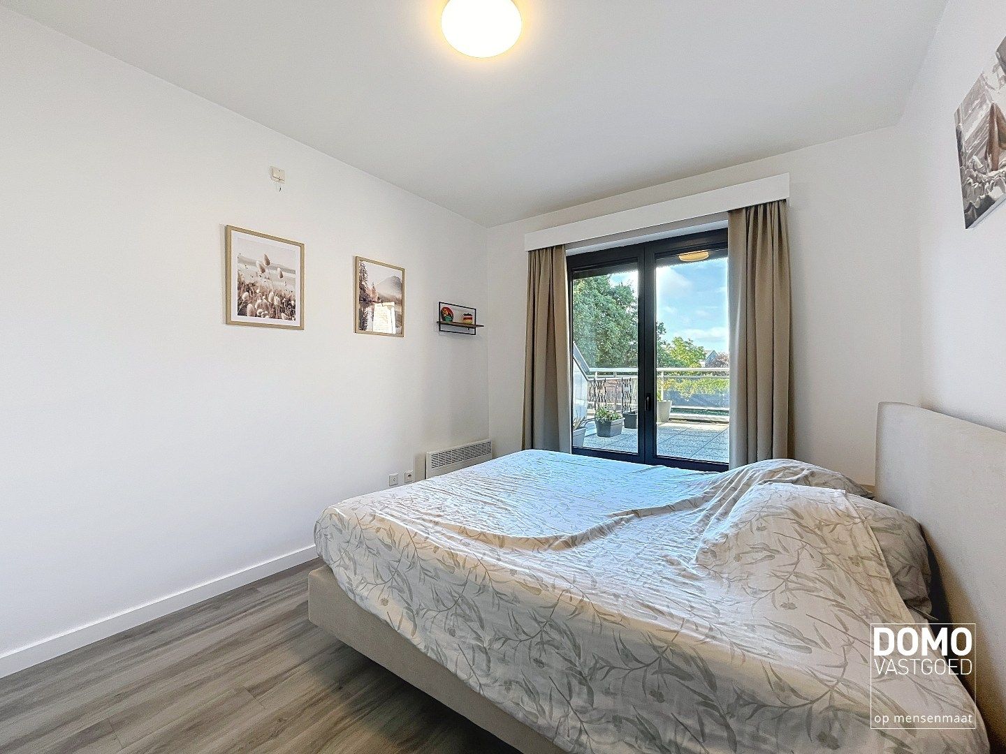 INSTAPKLAAR EN ENERGIEZUINIG 1 SLAAPKAMER APPARTEMENT MET RUIM TERRAS, ONDERGRONDSE AUTOSTANDPLAATS EN KELDERBERGING TE HASSELT foto 7