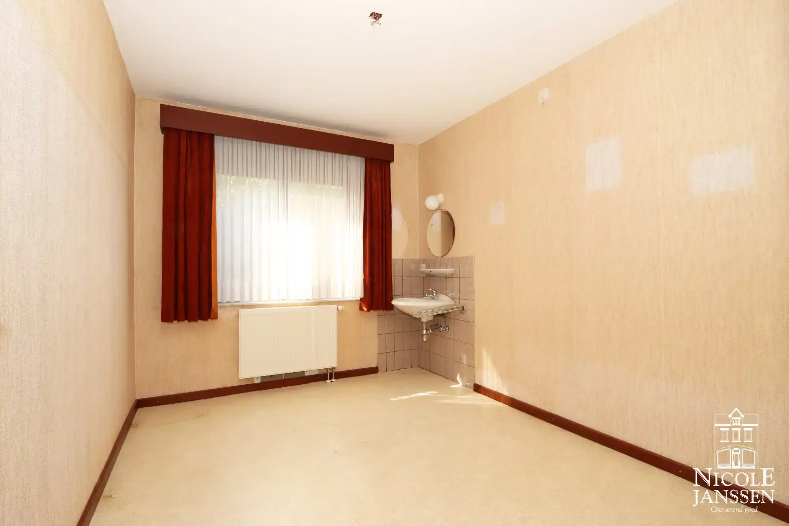 Gelijkvloerse verzorgde woning nabij het centrum van Maaseik foto 11