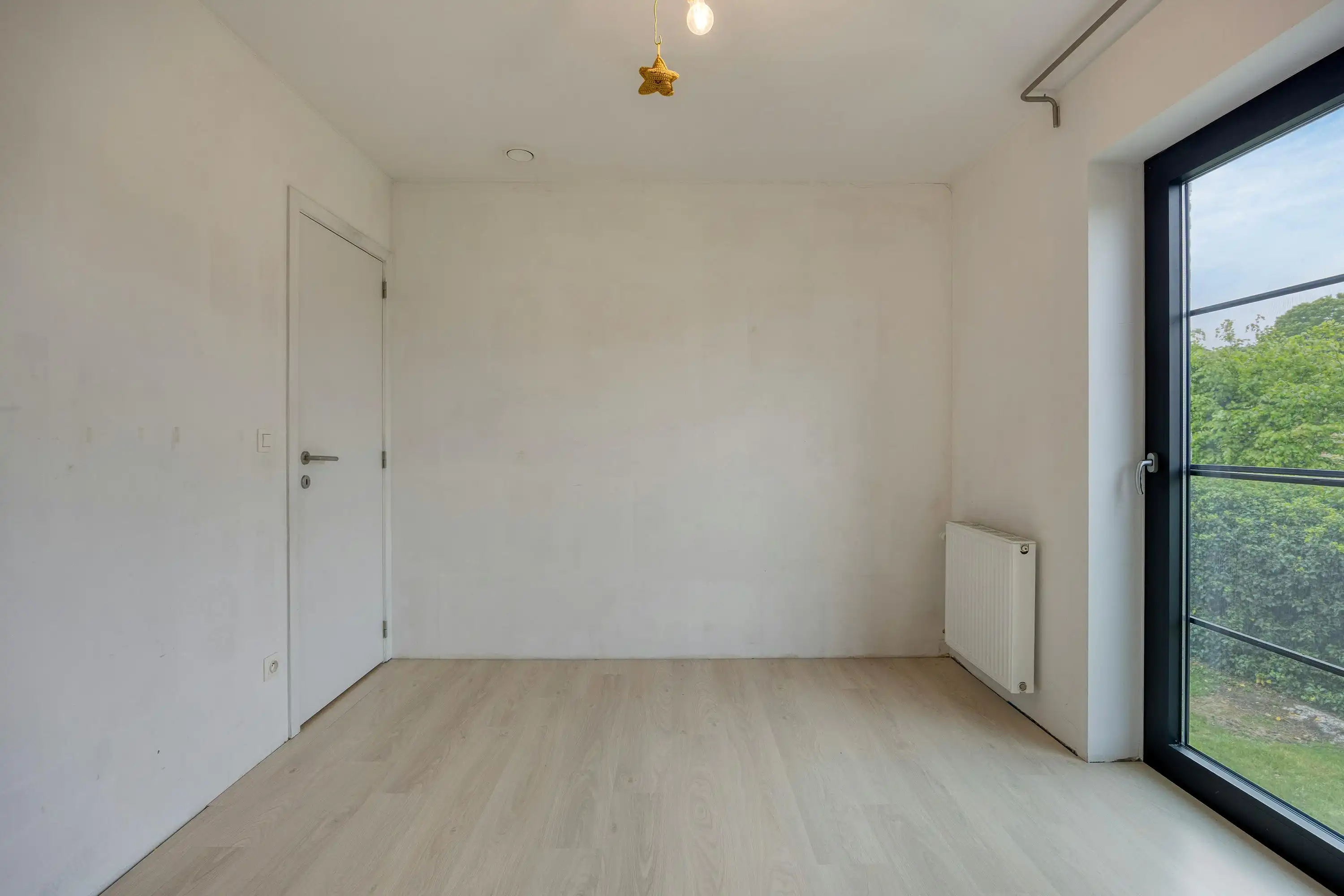 Instapklare gezinswoning met tuin in centrum Merelbeke foto 12