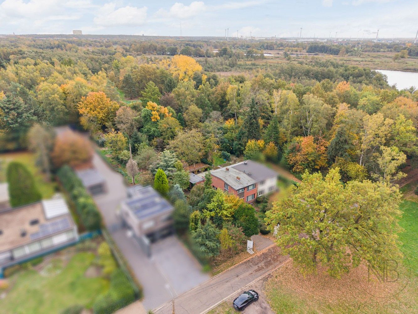 Woning met  bouwgrond te koop aan De Maten in Genk foto 2