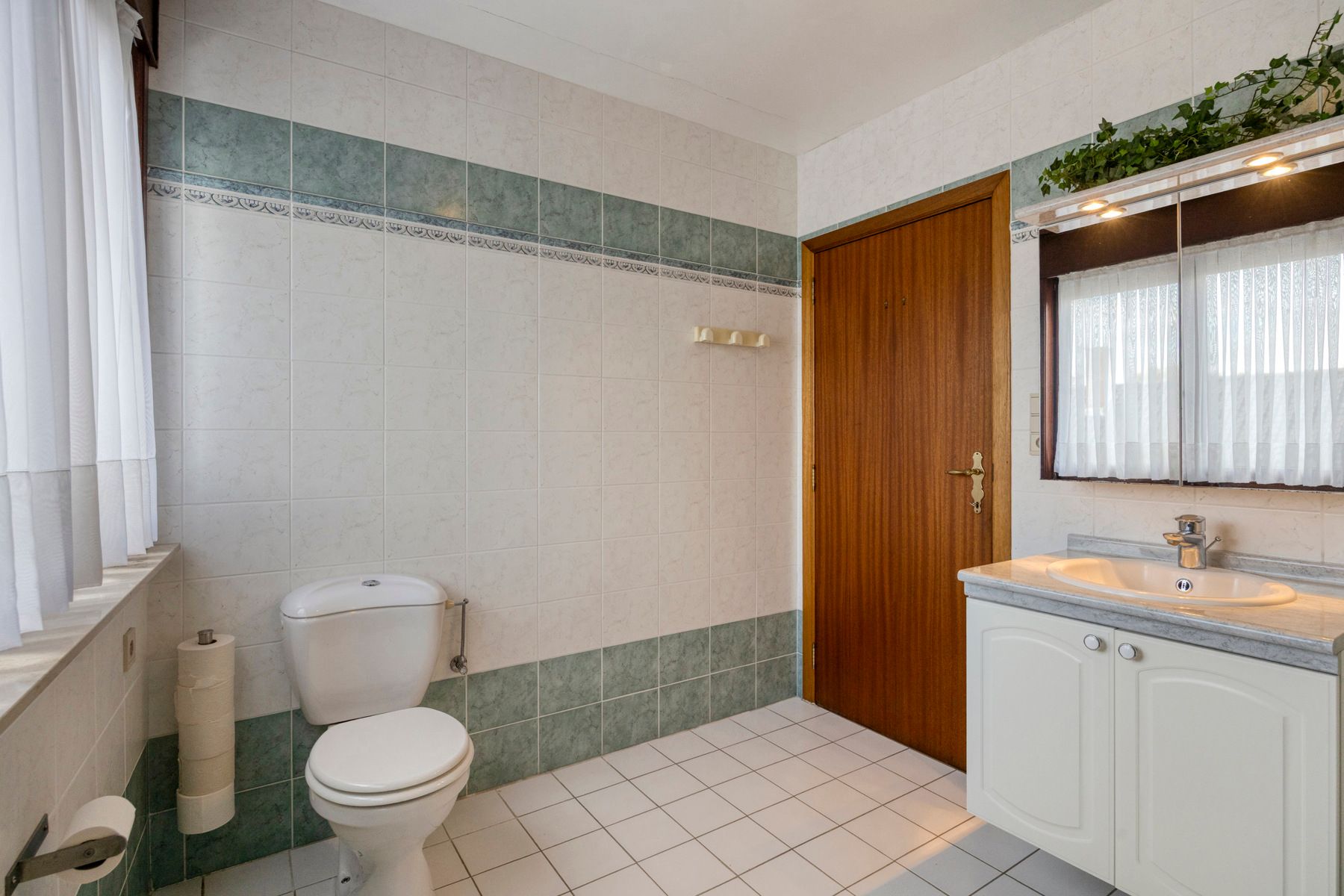 Instapklare woning met 3 slaapkamers en ruime tuin foto 15