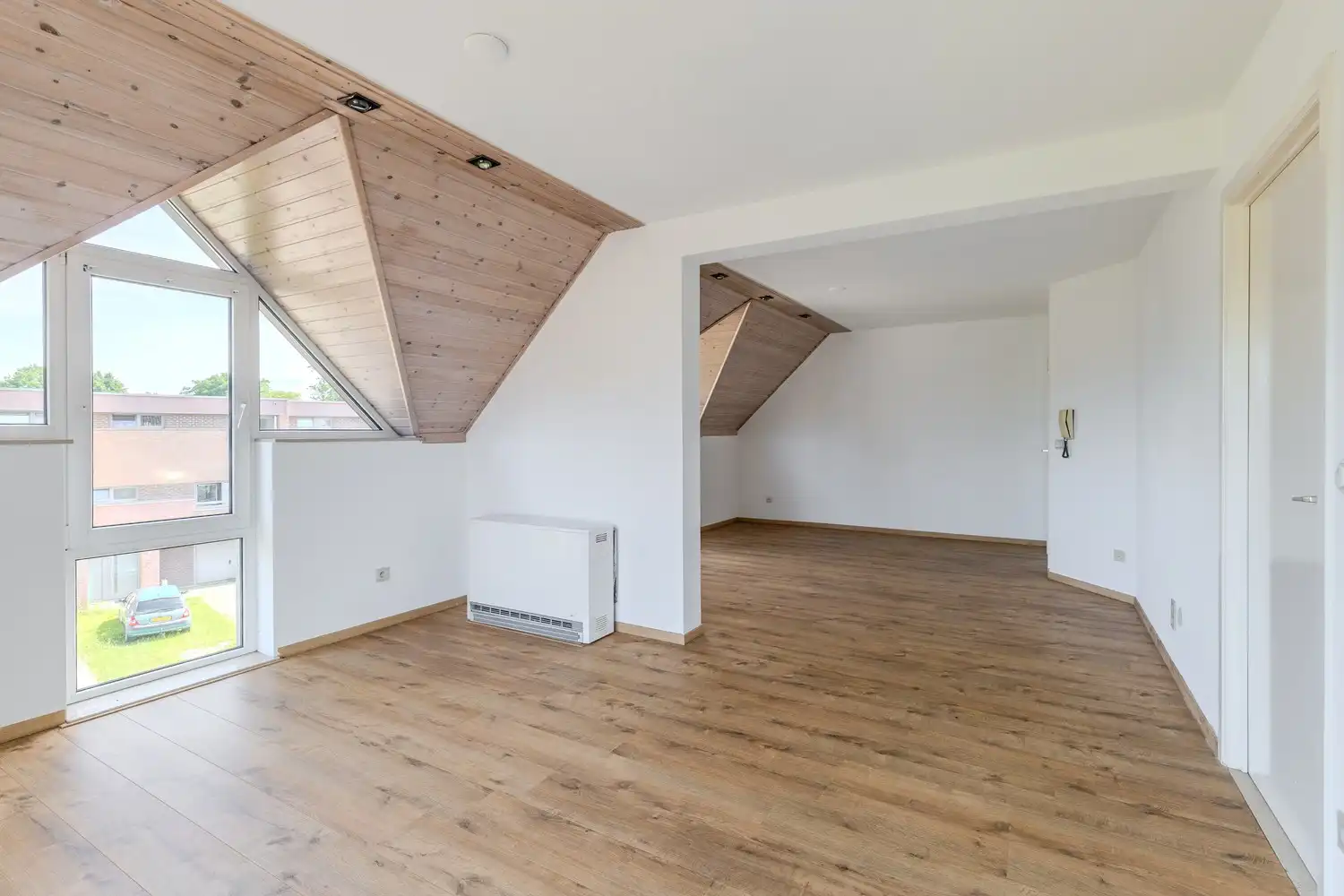 Instapklaar appartement met twee slaapkamers en ruime ondergrondse parking in Smeermaas, Lanaken. foto 6