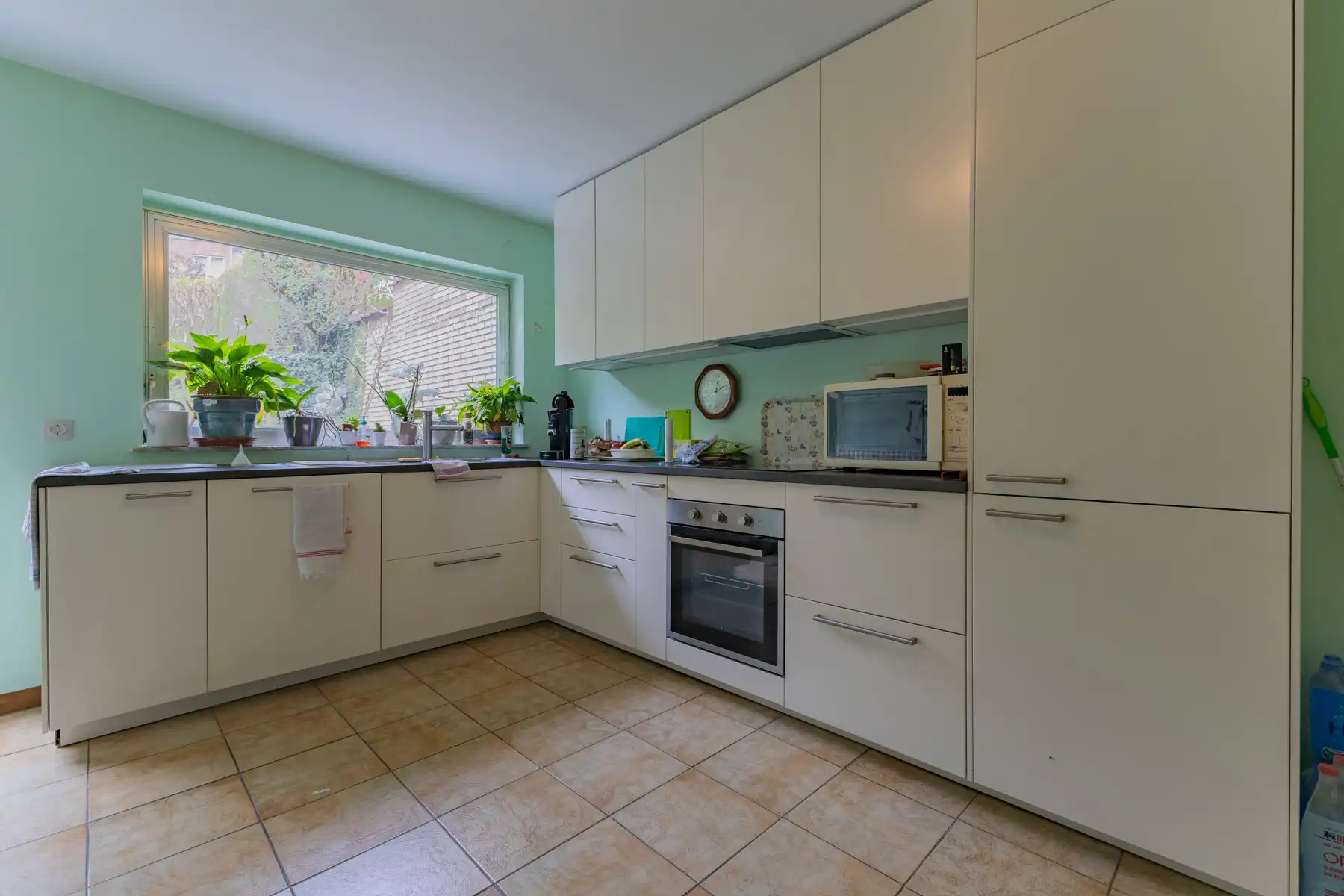 Zeer ruime woning met 5 slaapkamers, garage en tuin foto 11