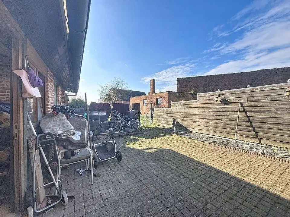 Ruime gezinswoning met diepe tuin in centrum Wuustwezel foto 22