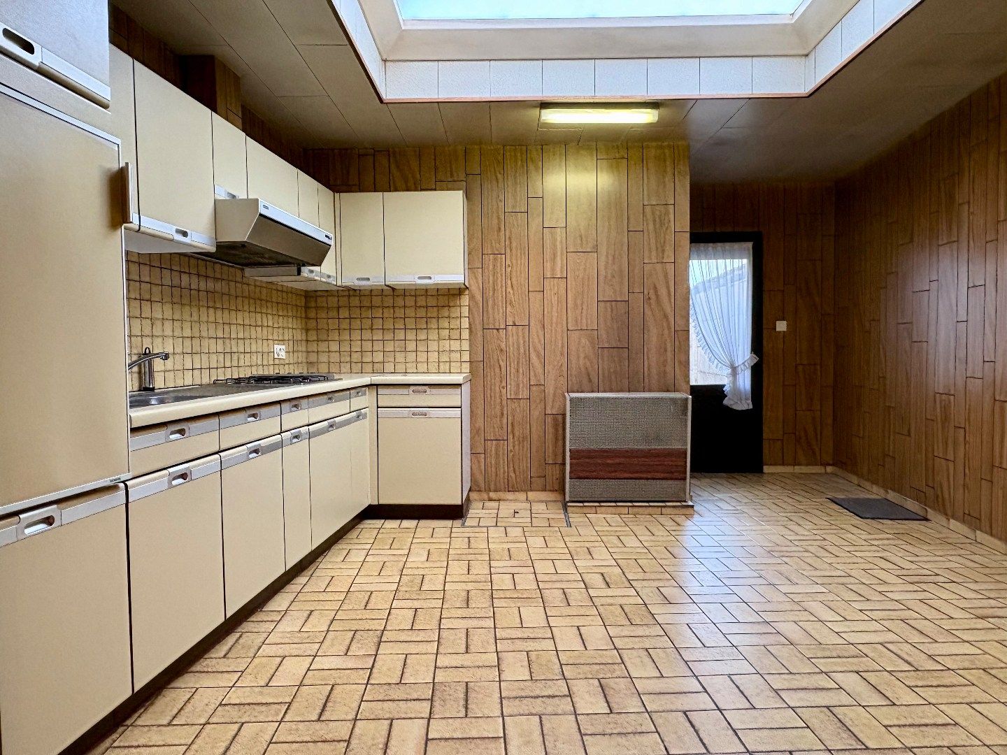 Woning dichtbij centrum Kuurne met parkeerplaats, gezellige tuin. foto 3