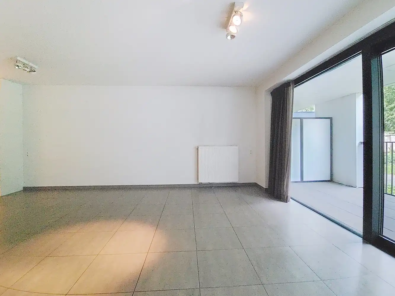 Ruim gelijkvloers appartement voor senioren met zicht op pastorietuin foto 3