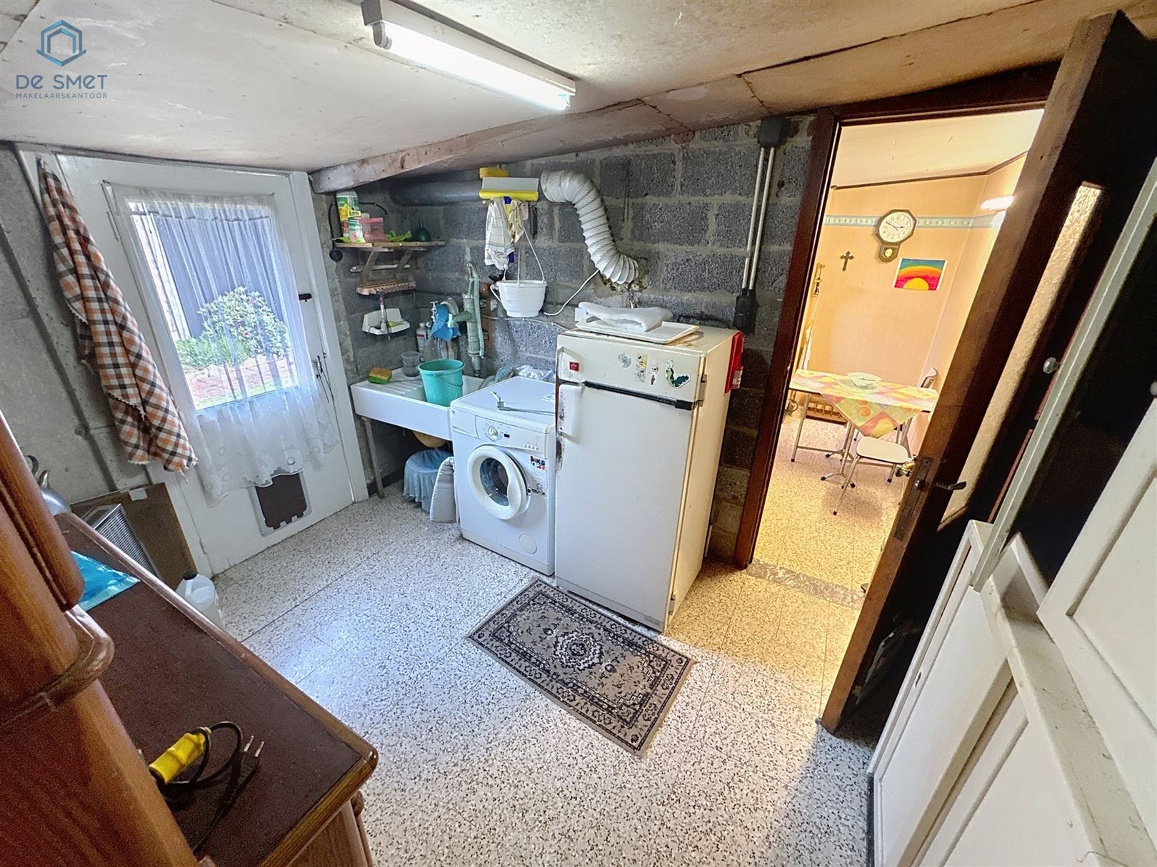 Veelzijdige Te Renoveren Woning met Handelsruimte in het Hart van Schendelbeke foto 11