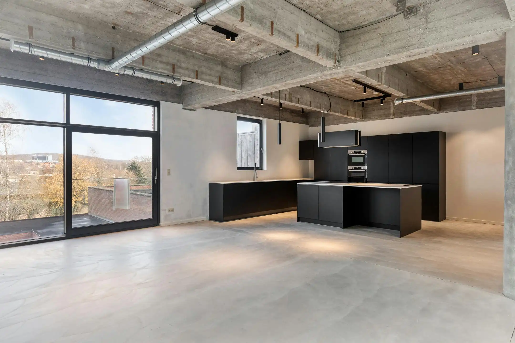 Ruime loft in Ronse te koop  foto {{pictureIndex}}