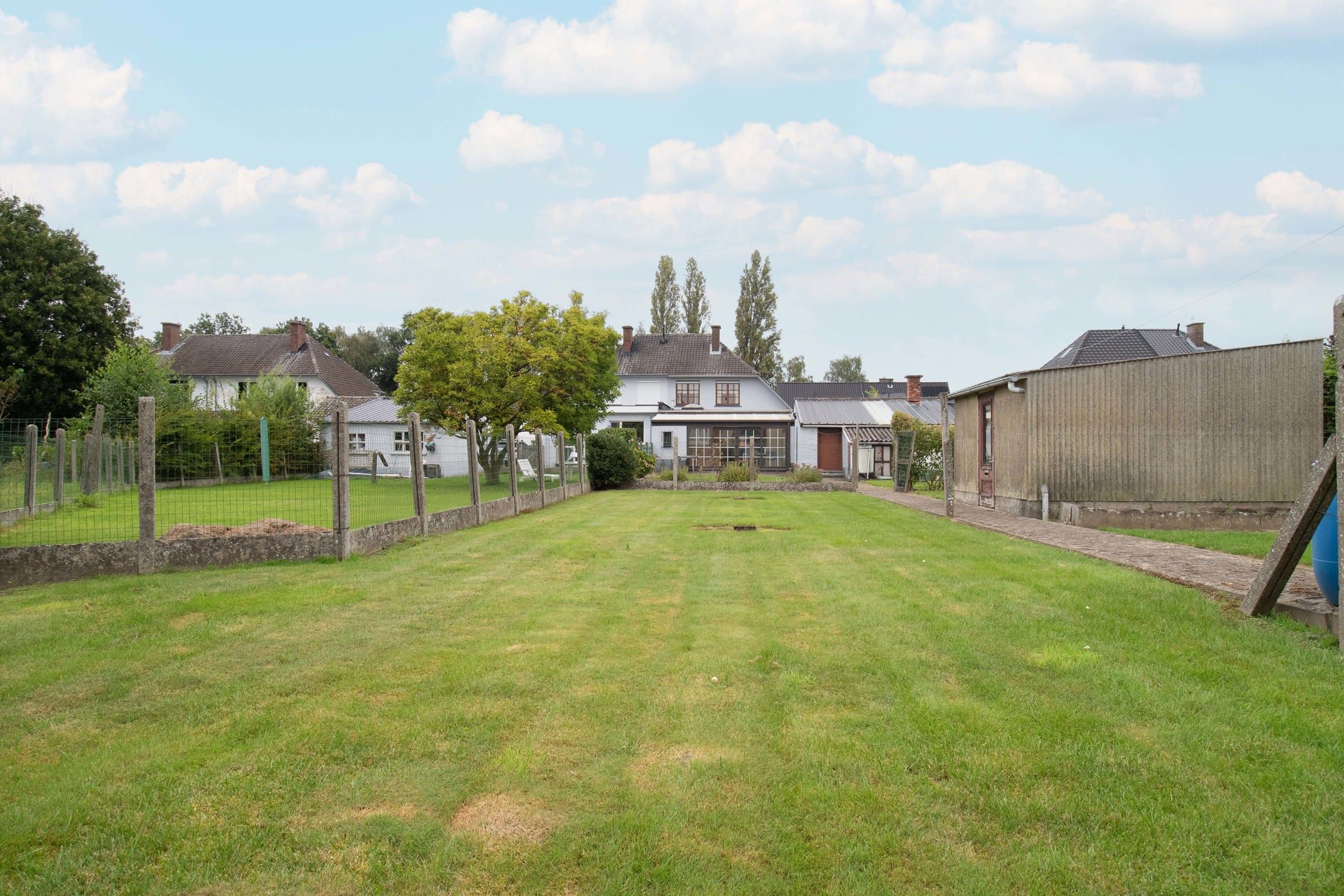 Charmante 3-gevelwoning met ruime tuin en garage foto 22