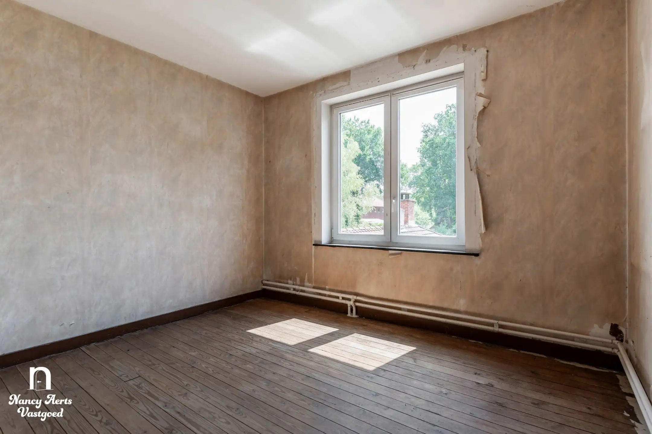 Karaktervolle renovatiewoning met tuin veel potentieel foto 10