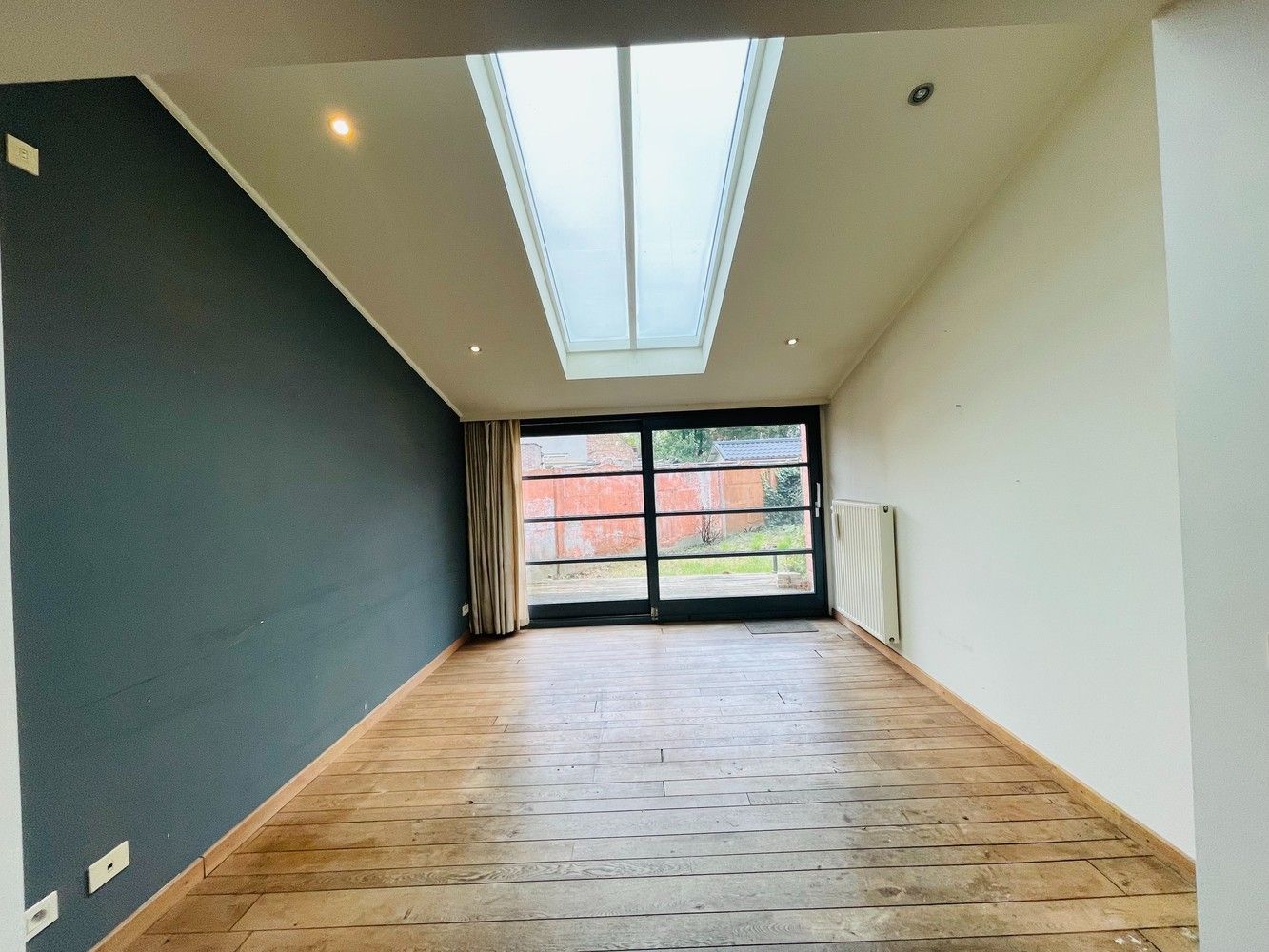 Assebroek, leuk ENERGIEZUINIG gezellig  instapklaar woonhuis met 3 SLAAPKAMERS en tuintje foto {{pictureIndex}}