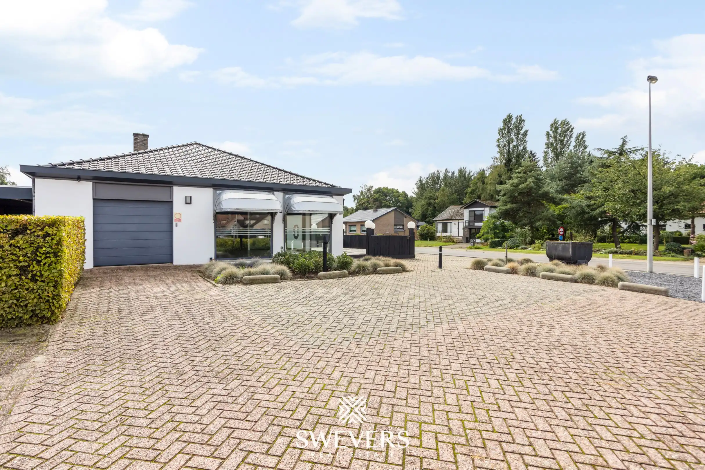 Gelijkvloerse woonst met handelsruimte op 28 are 17 ca op mooie zichtlocatie in Heusden-Zolder foto 43
