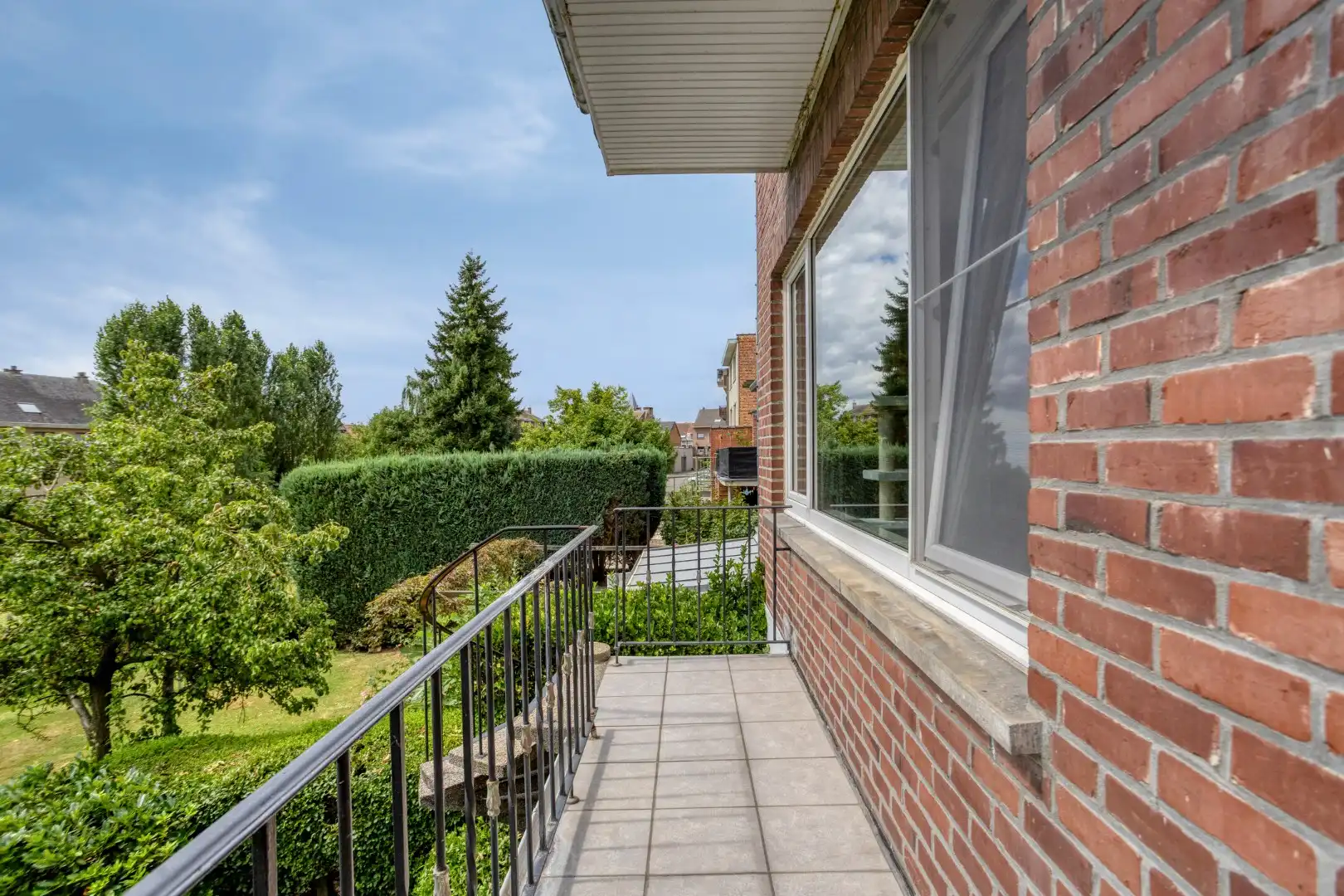 Opbrengsteigendom met tuin en 2 verhuurde appartementen in Wemmel foto 10
