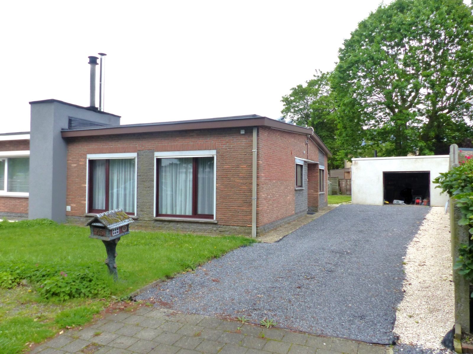 Charmante woning met zonnige tuin en garage op TOPLIGGING! foto 1