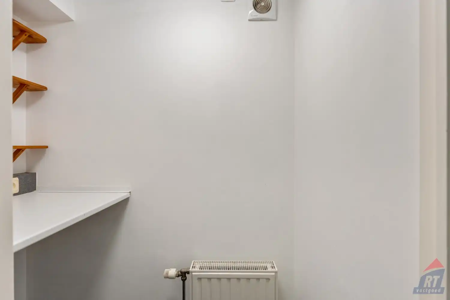 Veelzijdig pand met praktijkruimte en duplex appartement op toplocatie in Sint-Truiden foto 7