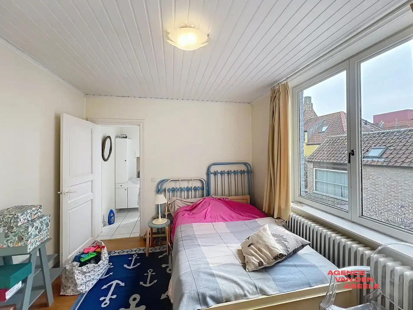 Centraal gelegen handelswoning met 4 slaapkamers en riante tuin  foto 16