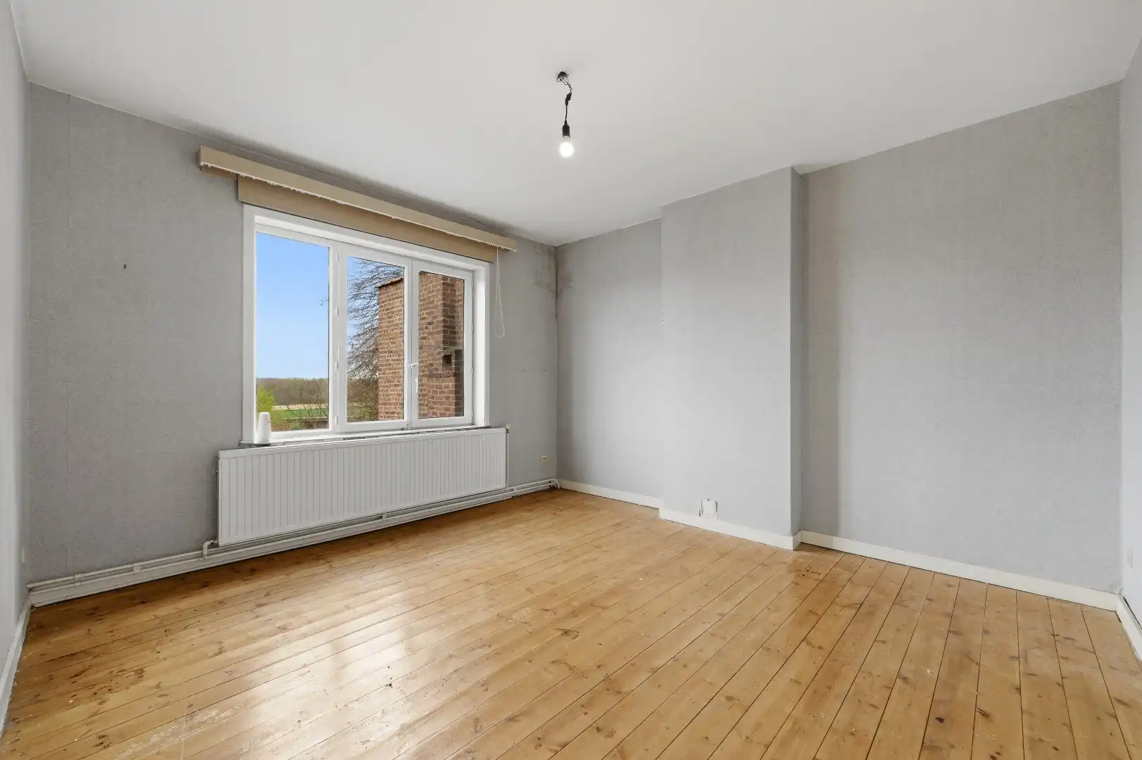 Instapklare rijwoning op een goede ligging in Tienen, met een prachtig zicht op de velden. foto 13