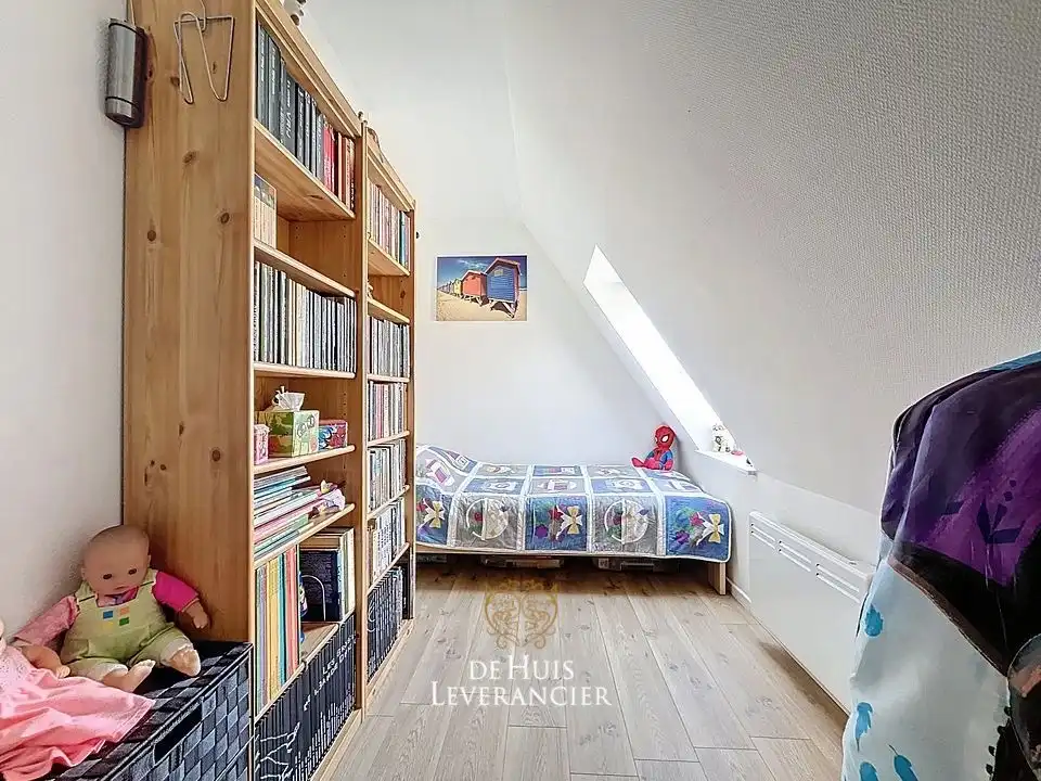 Uw eigen plek aan zee: stijlvol duplex-appartement met 3 slpks in het hart van Koksijde foto 16