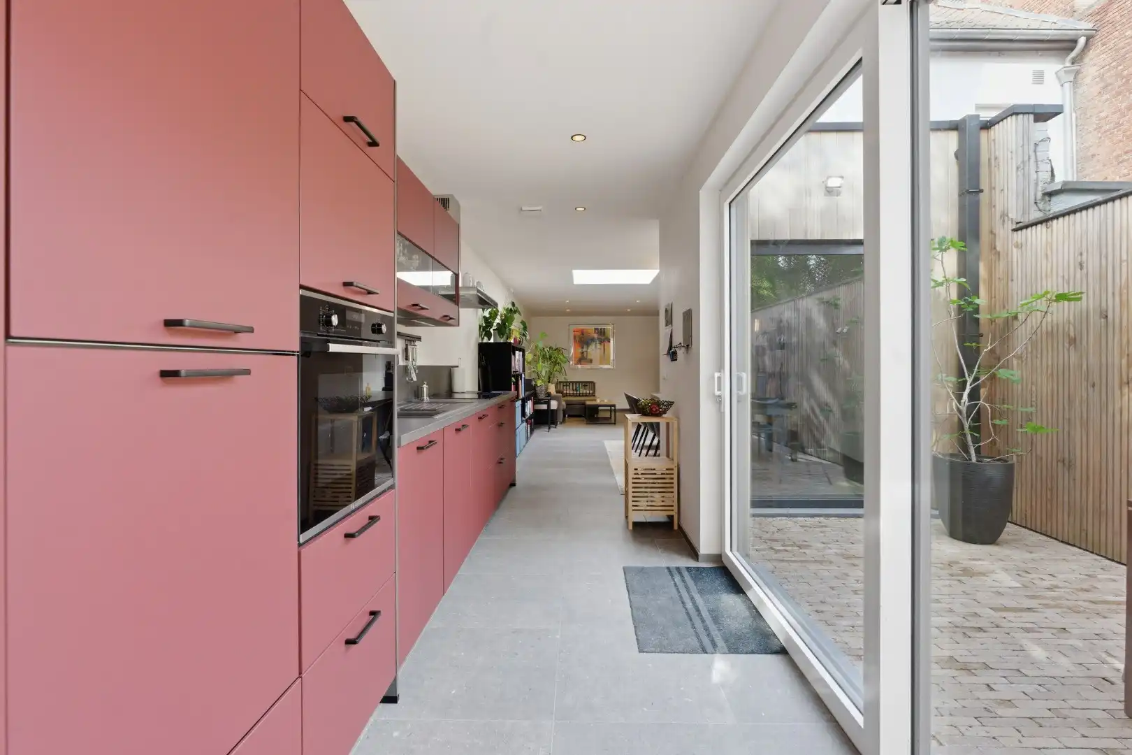 Exclusief gerenoveerde herenwoning met 4 slaapkamers, 2 badkamers en een adembenemende stadstuin. foto 16