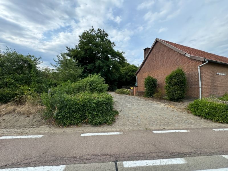 Te renoveren langgevelwoning met veel potentieel op ruim perceel in Herselt foto 2
