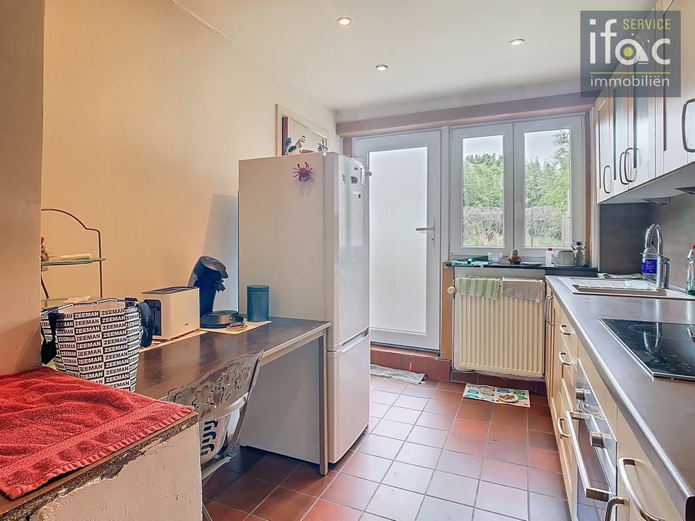Rijhuis te koop foto 4