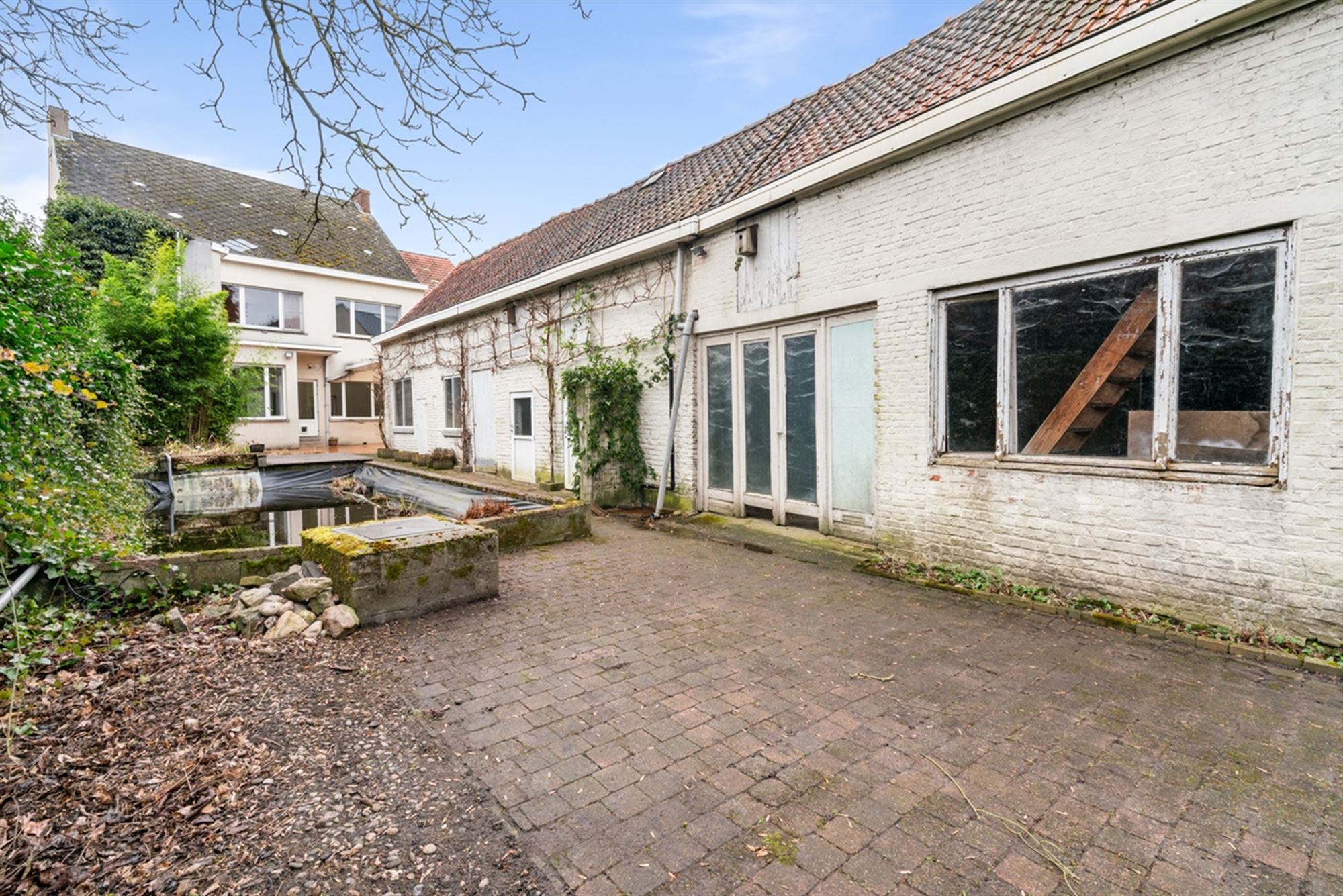 Te renoveren RUIME BURGERSWONING met BIJGEBOUW op een perceel van 668m² foto 9