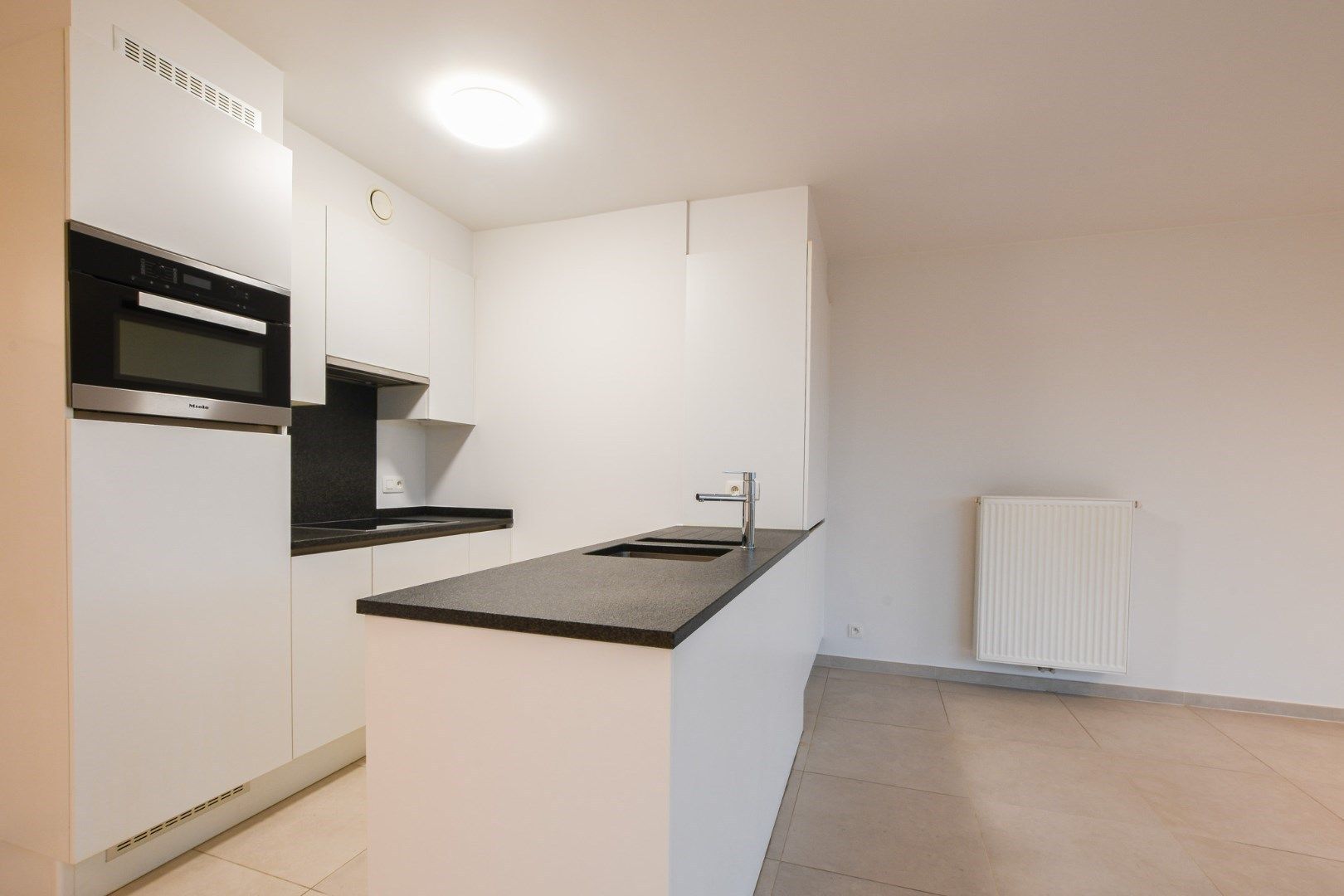 Gelijkvloers appartement met tuintje in De Haan (Vosseslag), op wandelafstand van strand en zee! foto 6