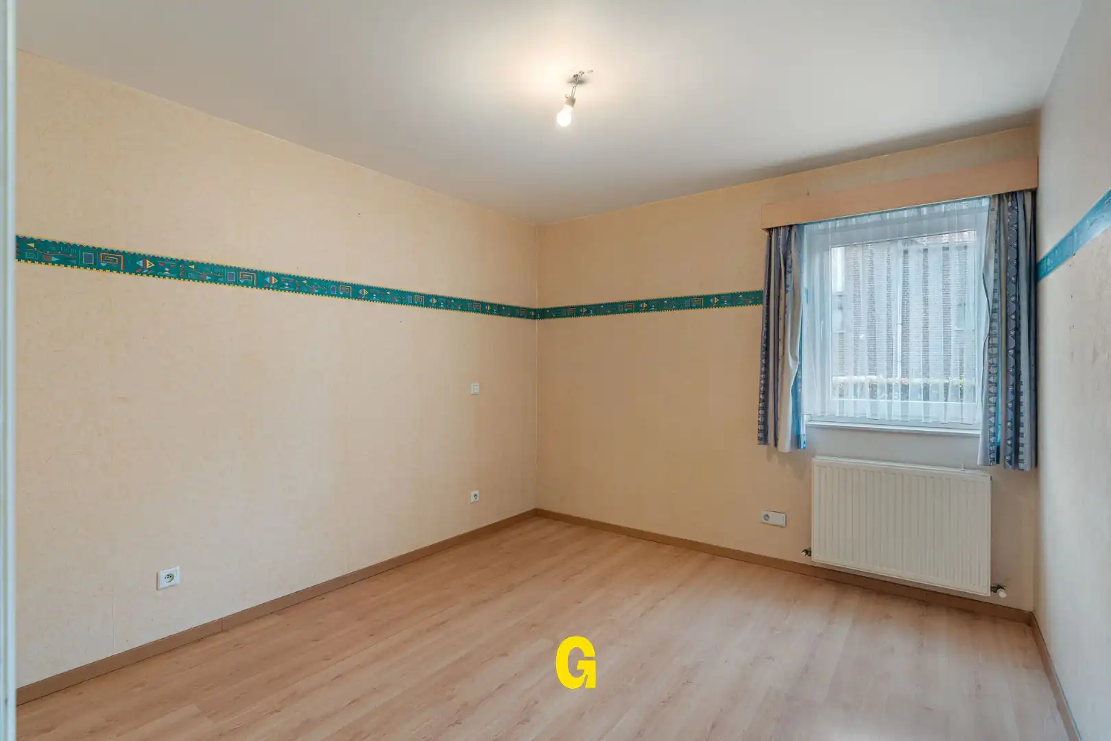 Degelijk (rolstoelvriendelijk) gelijkvoersappartement met terras uitgevend op de tuin, afsluitbare garage en berging foto 18