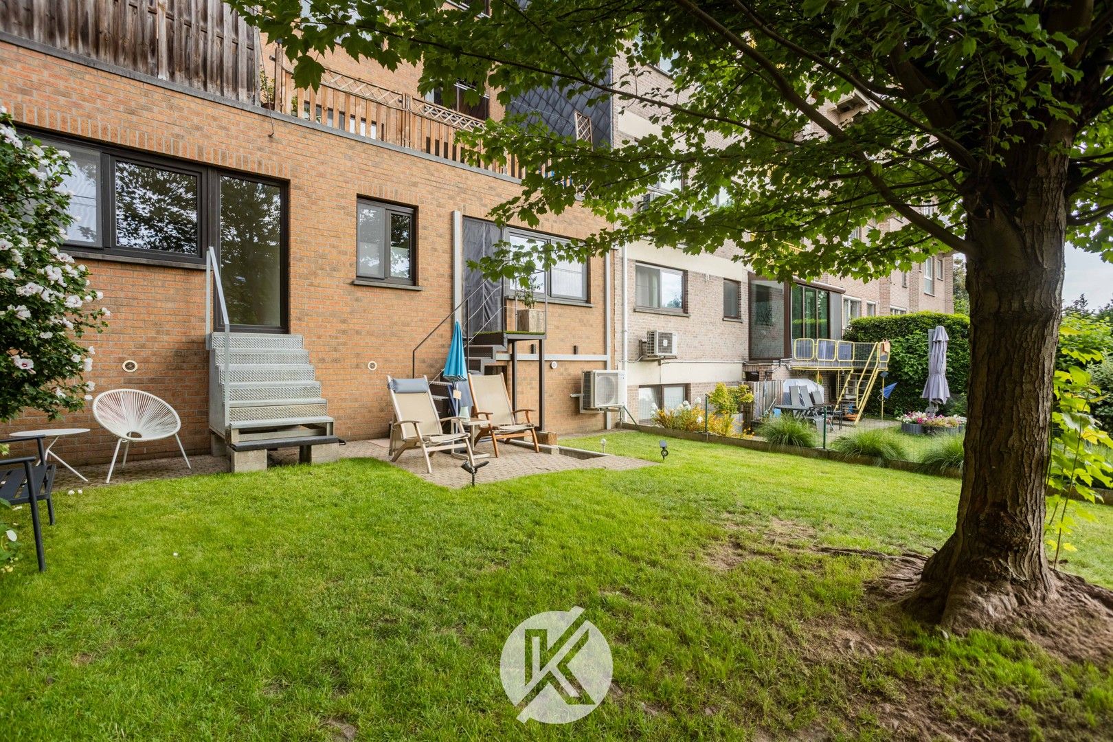 Smaakvol gelijkvloers appartement met tuin foto 11