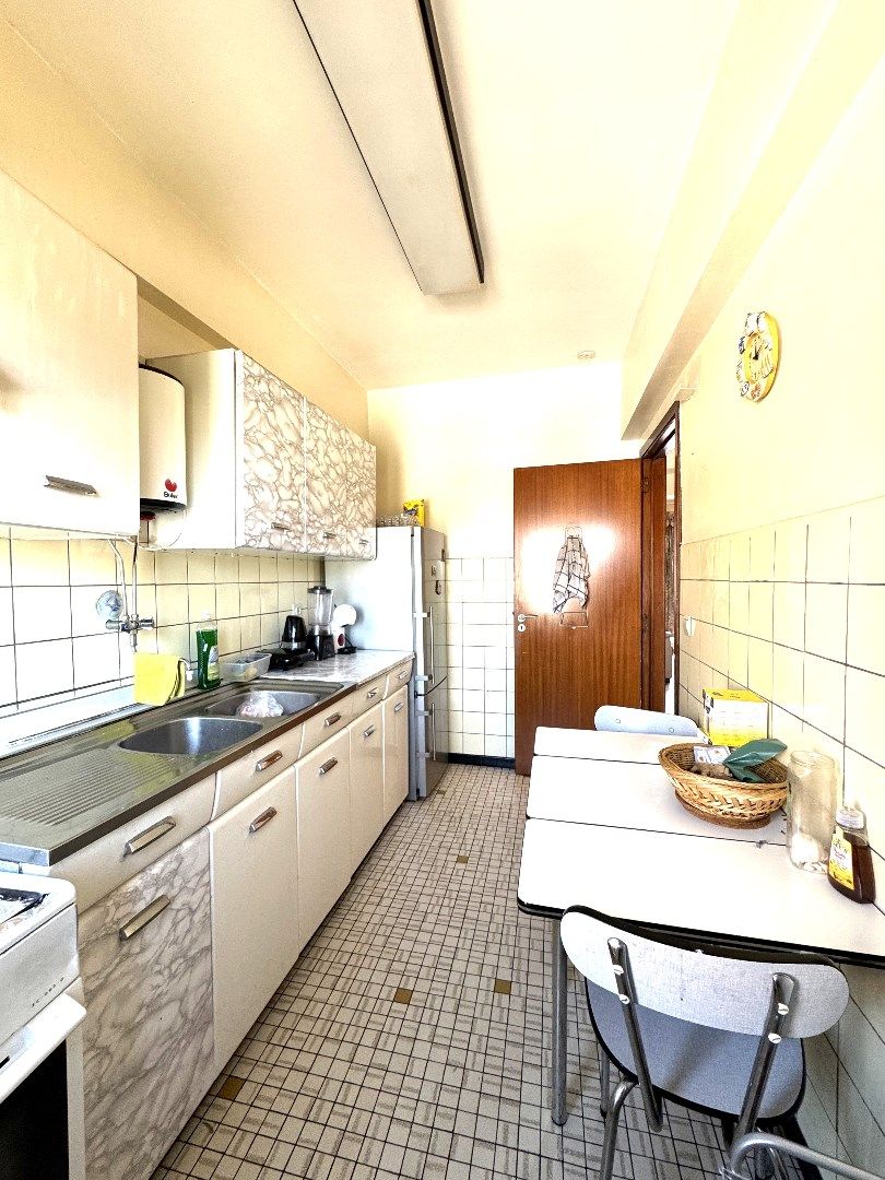 Ruim appartement met veel potentieel op toplocatie in Vilvoorde. foto 14