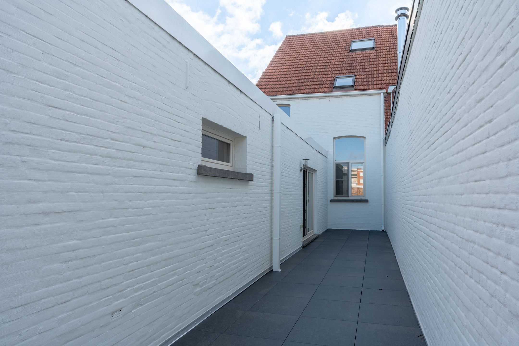 Handelspand met woonst (350m²) op wandelafstand van de Grote Markt. foto 17