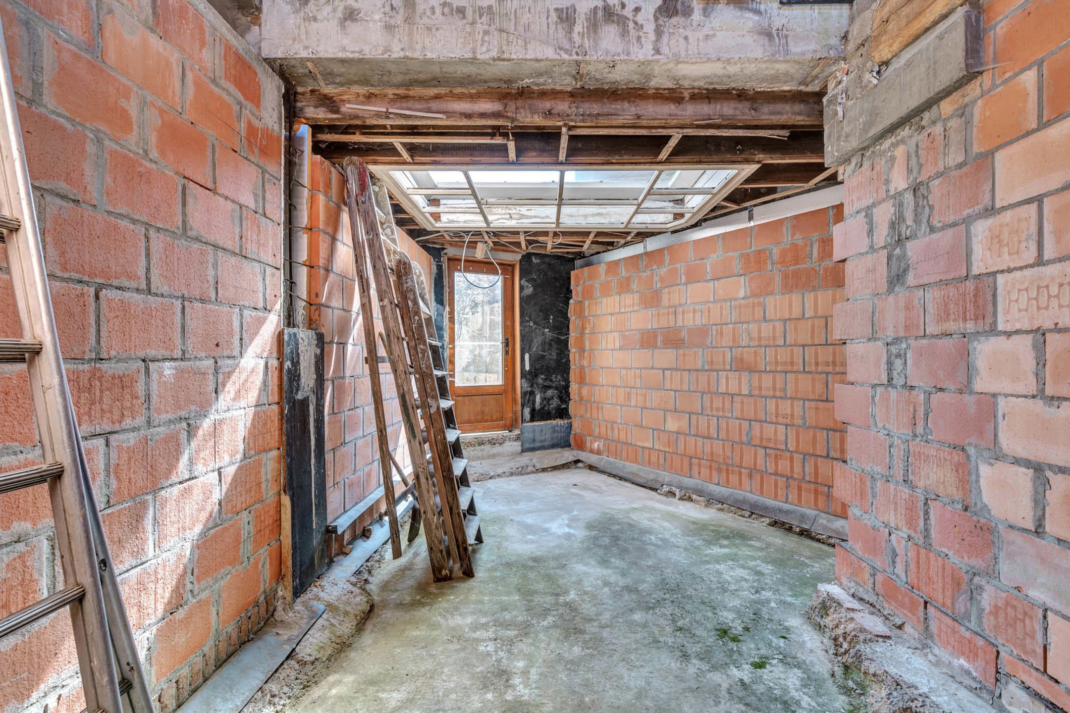 Te renoveren woning op strategische locatie te Ninove foto 8