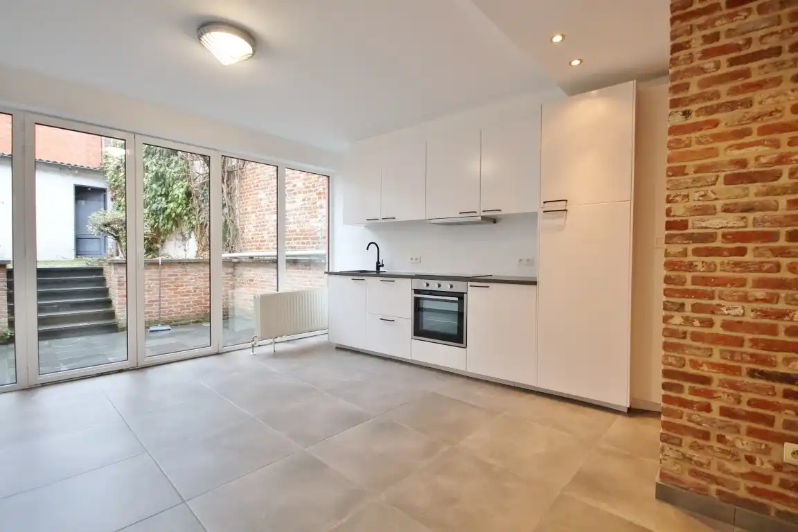 Gunstig gelegen gelijkvloers duplex appartement nabij de Grote Markt foto 7