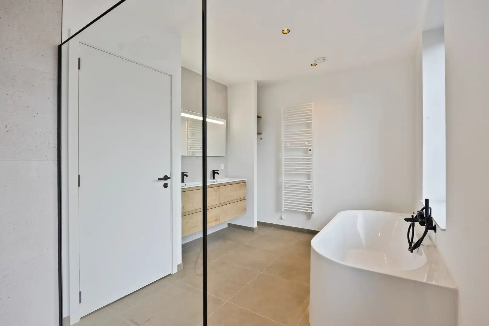 Totaal gerenoveerde woning met 3 slaapkamers, 2 badkamers, tuin en terras in Kessel-Lo! – EPC 14 kWh/m² - bewoonbare opp. 152 m² foto 16