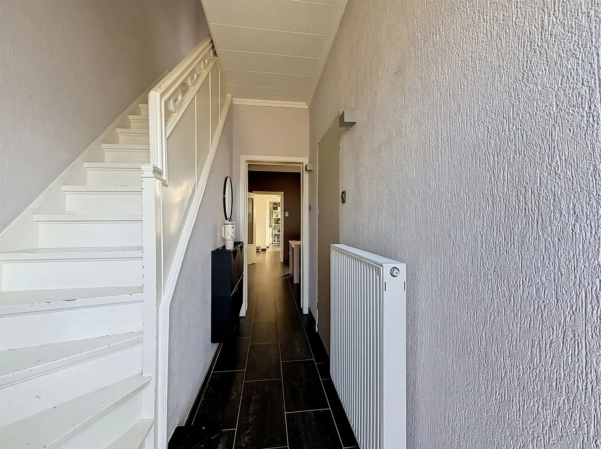 Instapklare woning met halfopen karakter en 4 slaapkamers nabij centrum Sint-Niklaas! foto 5