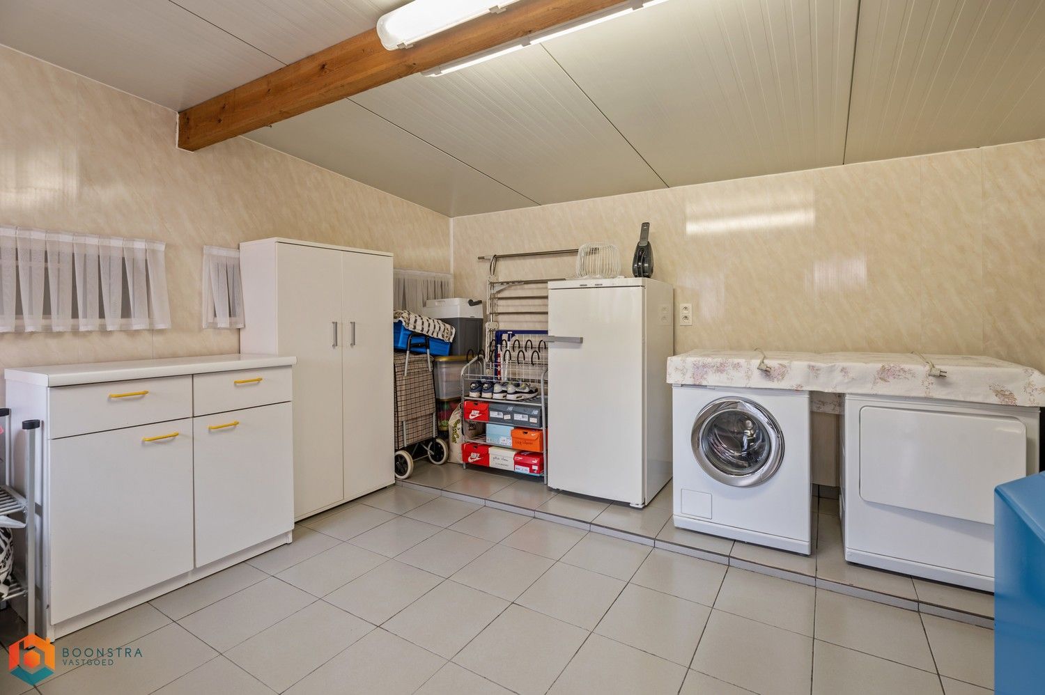 Verzorgde woning met 2 slpkrs, leuke tuin en garage foto 28