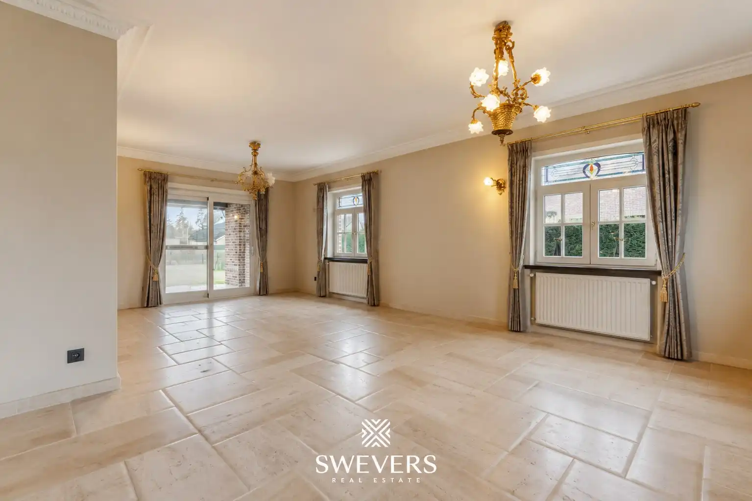 Ruime open bebouwing met 4 slaapkamers en zonnige tuin in Houthalen foto 2