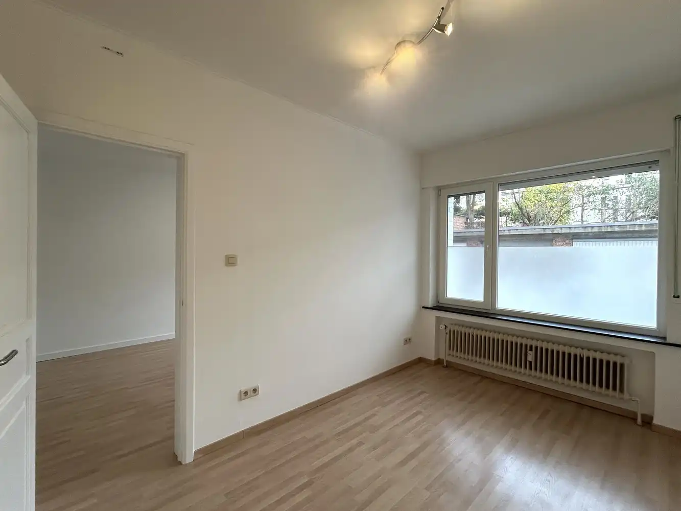 Instapklaar gelijkvloers 1-slaapkamerappartement met ruim terras in Leuven foto 2