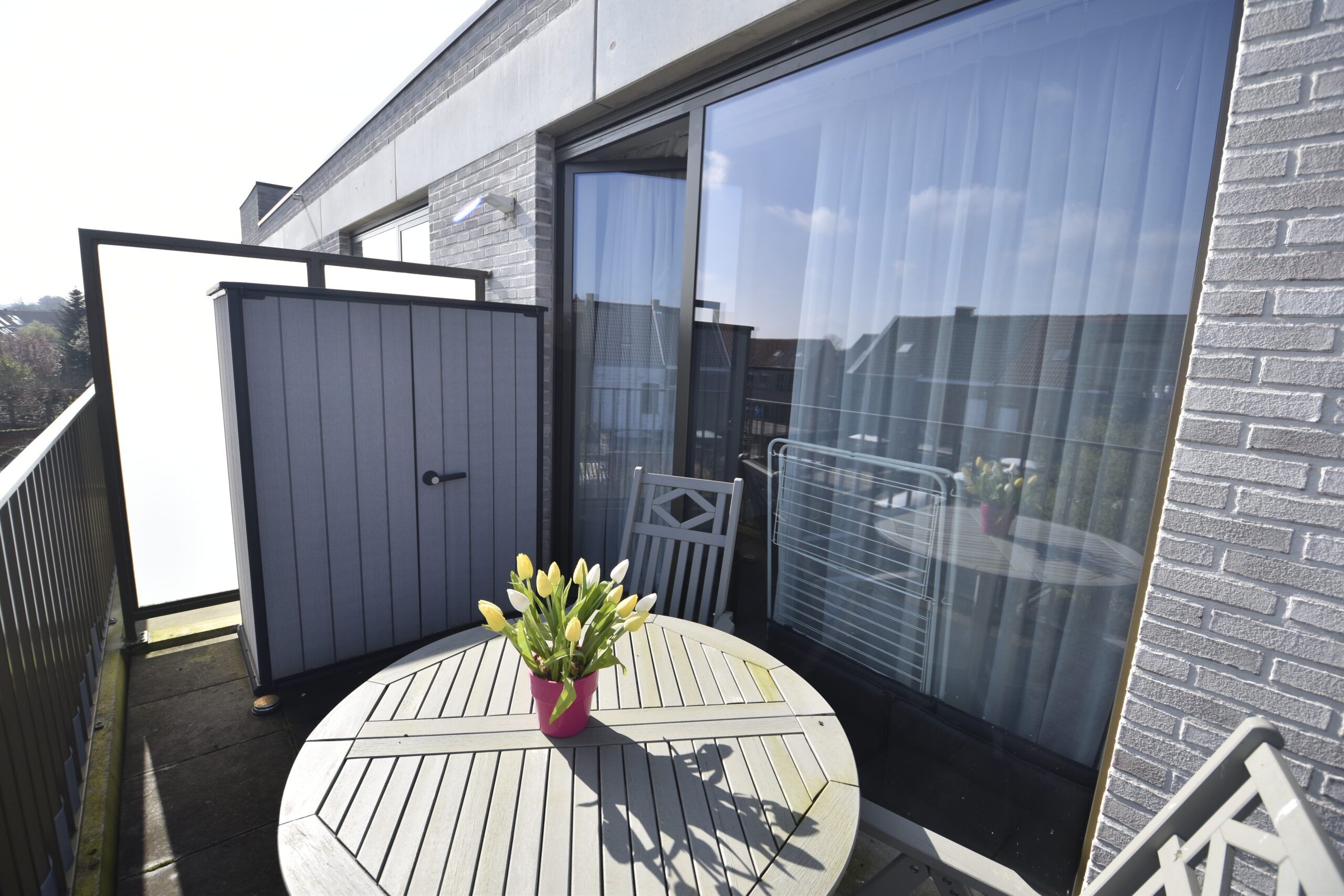 Assistentiewoning met 1 slaapkamer, terras en autostaanplaats in Sint-Niklaas foto 6