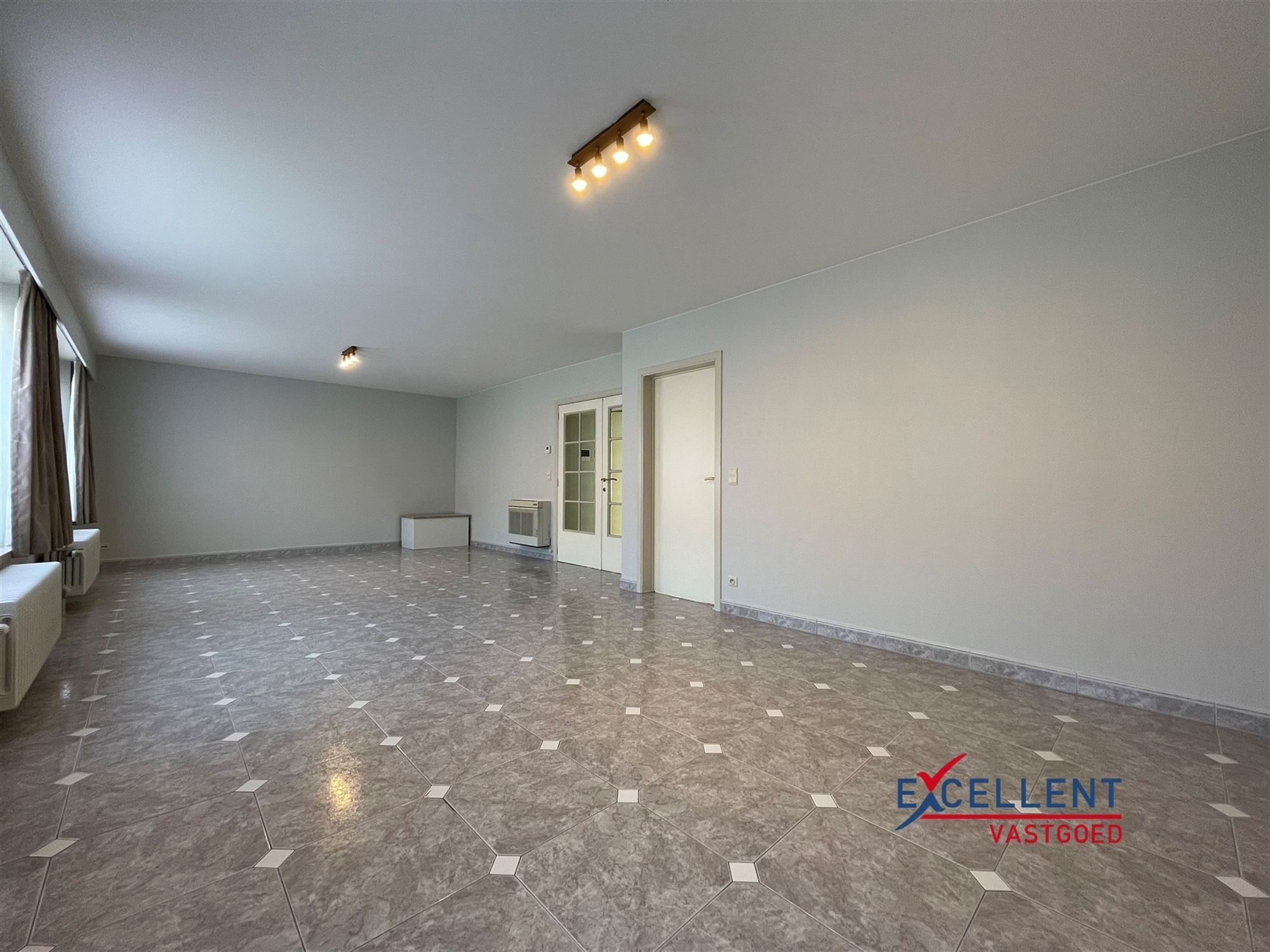 Ruim 2-slaapkamer appartement te huur nabij de Markt van Deinze foto 2